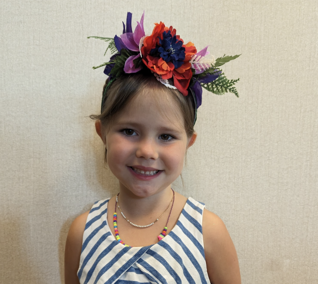 Me with a silk flower headband that I made.